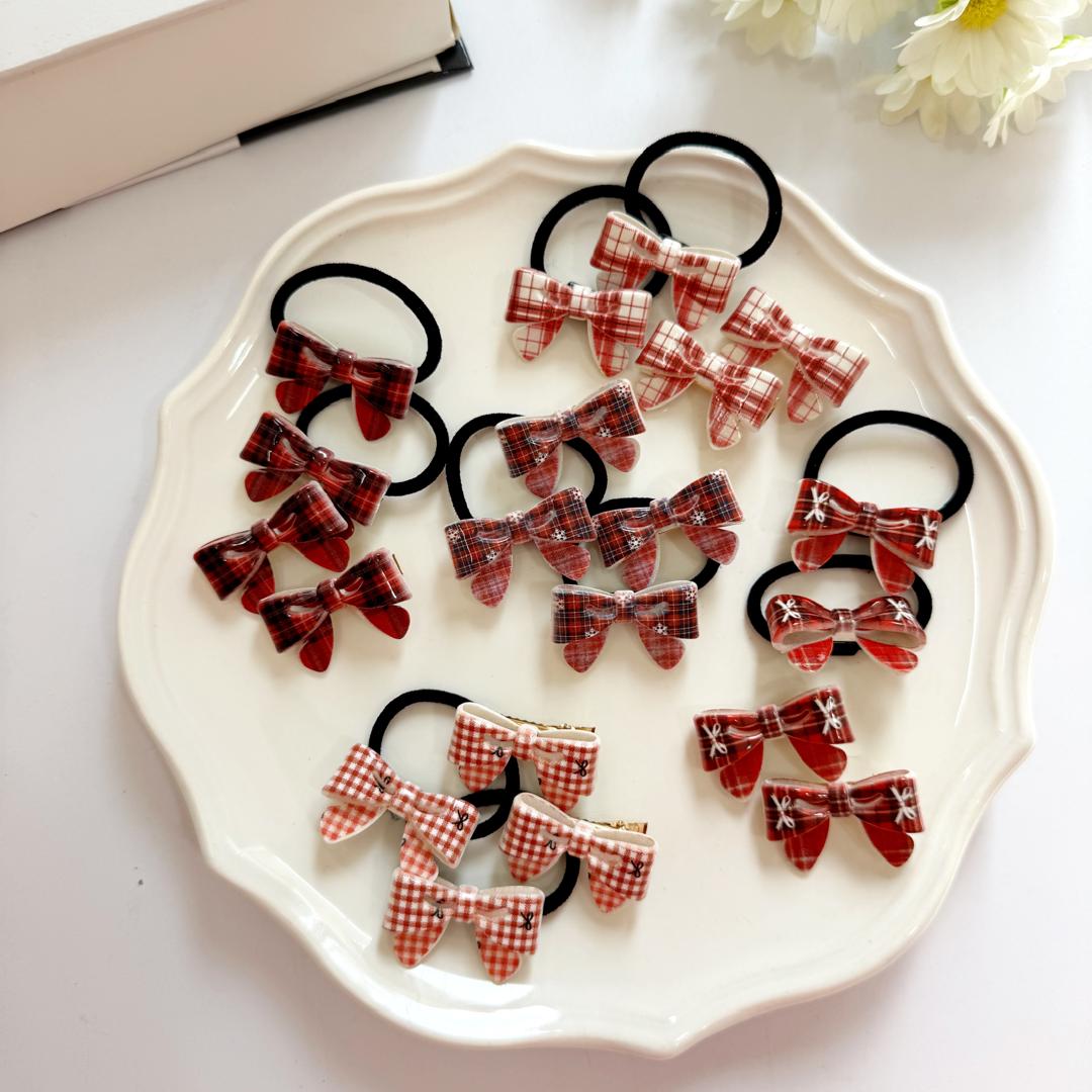 IMG-20251103-WA0022 پک ۲ عددی کش و گیره پاپیون قرمز - Image 1